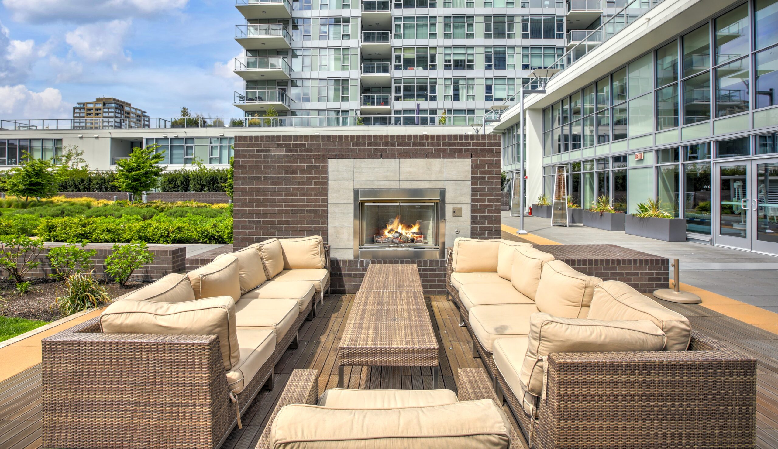 Image showcasing Luxury apartment building with open-air park. - REMI Network